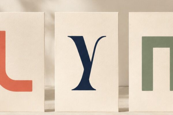 Three large letterforms in different type styles displayed on separate cards, illustrating how typography changes the appearance of text.