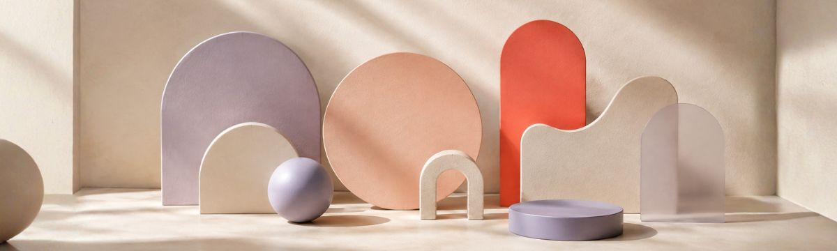 Playful palette of lavender, peach, cream and coral geometric forms with rounded asymmetrical shapes.